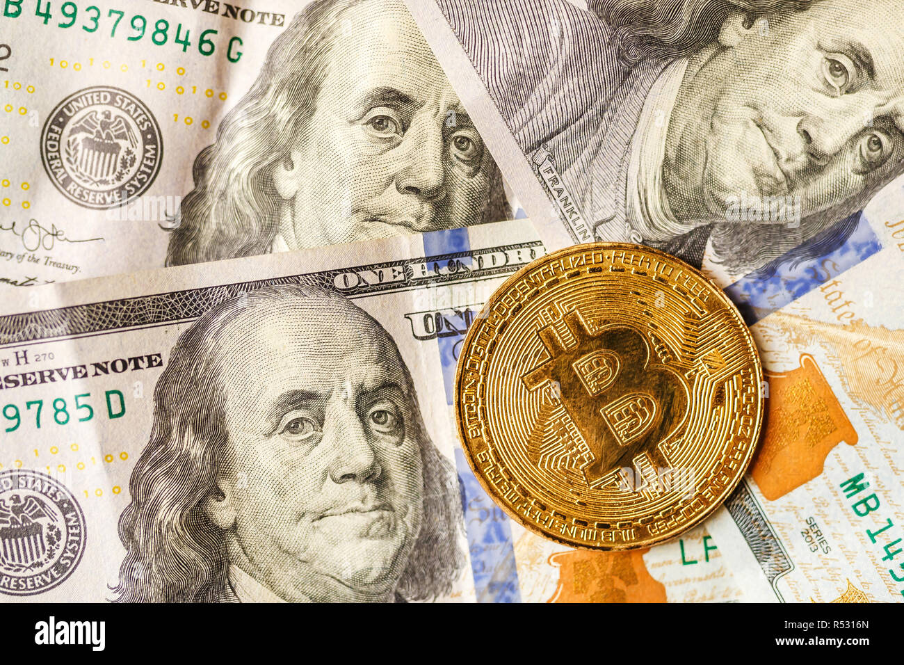 Virtual Money Golden Bitcoin On Hundred Dollars Bills Background - 